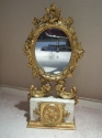 Giltwood and Painted Reliquary Mirror